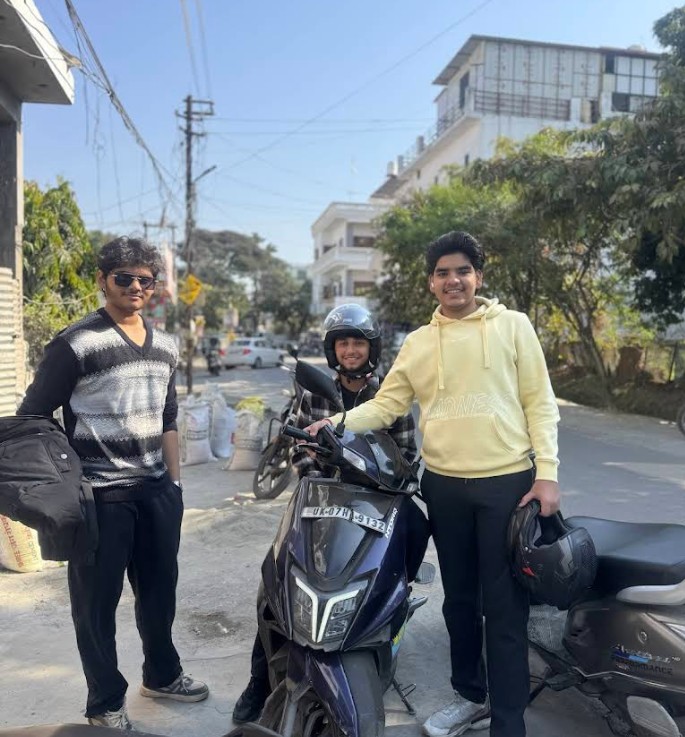 Happy customers with their rented scooter